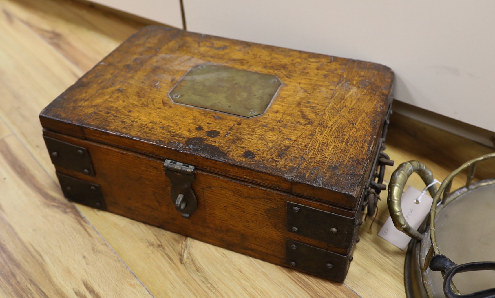 An oak and metal bound box, a circular brass tray and a pair of draper's scissors